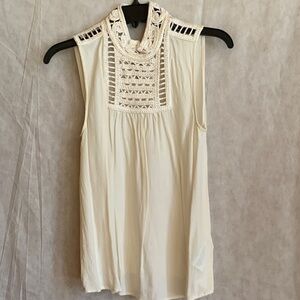 Cream Sleeveless Top with bohemian vibes